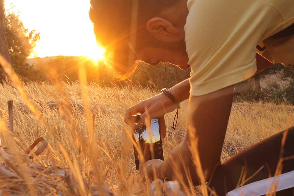 Use your phone to check low or awkward shooting positions 